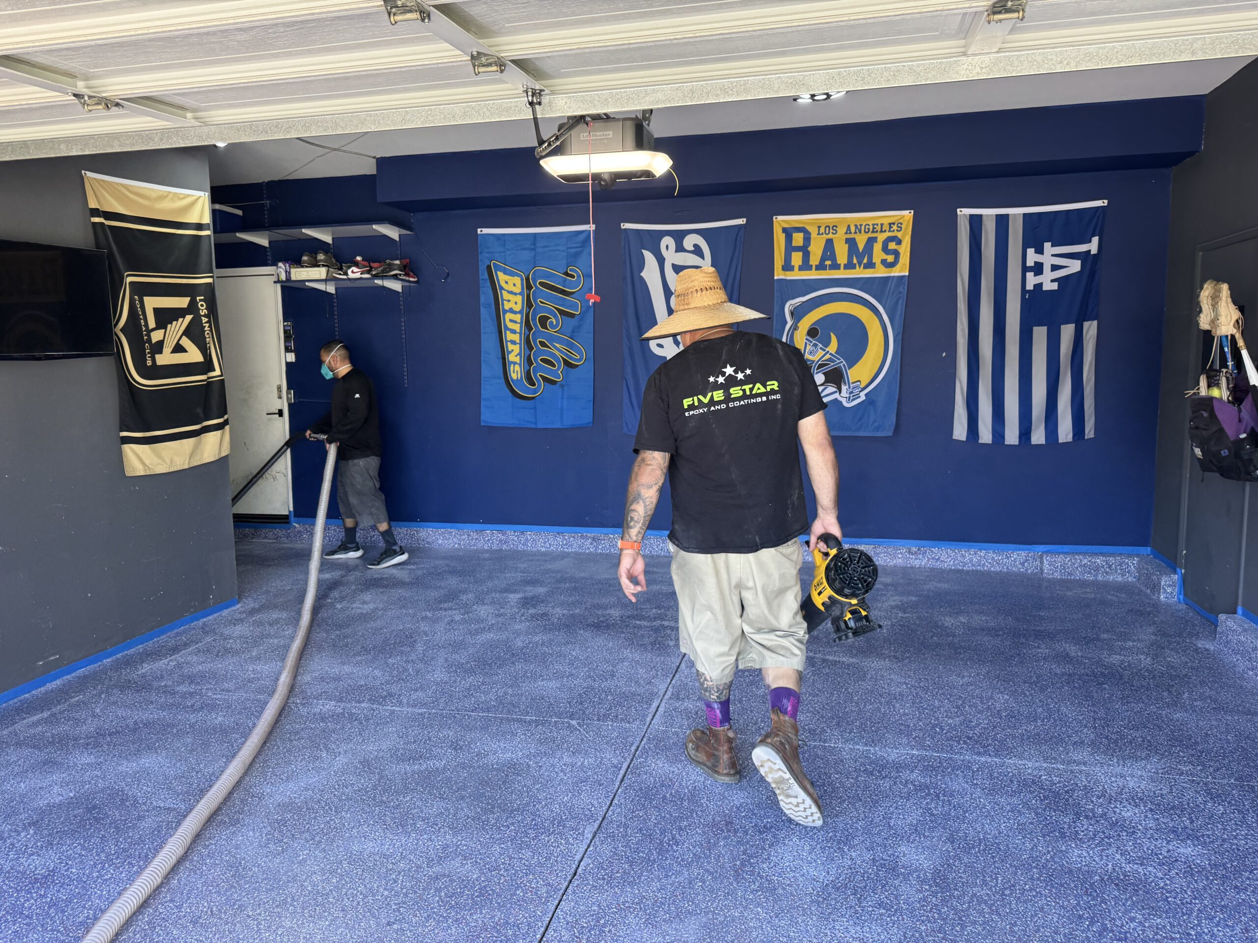 Cleaning up on day 1 of epoxy flooring in Santa Clarita